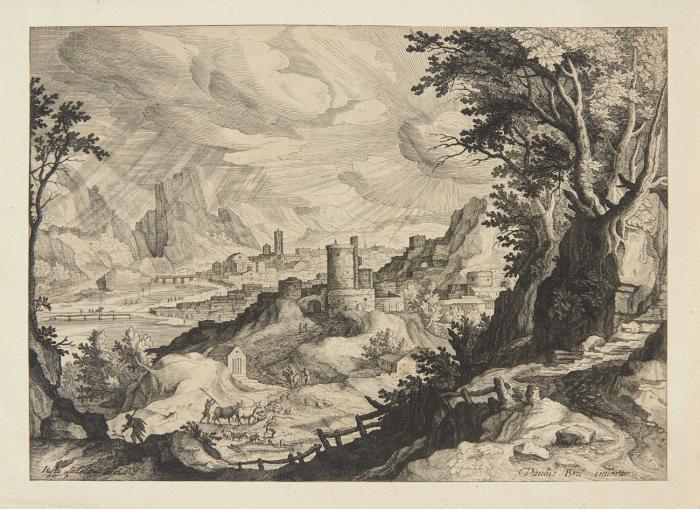 Landschaft mit einer Stadt im Hintergrund.