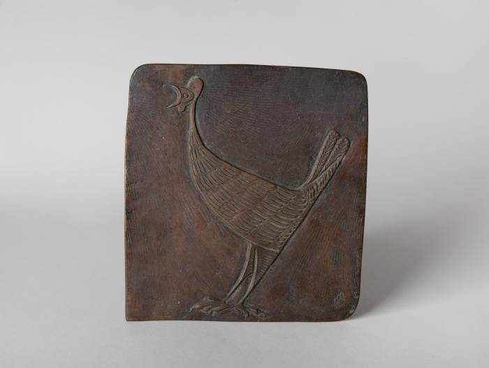 Relief mit krähendem Hahn