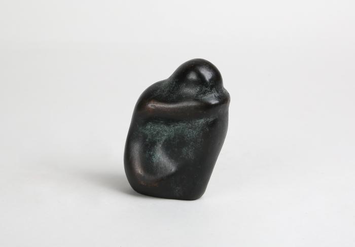 Kauernde Figur